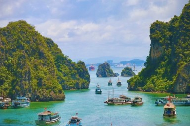 Halong Bay – Sung Sot Cave – Hanoi | Tai Chi & Disembarkation ( B, Br)