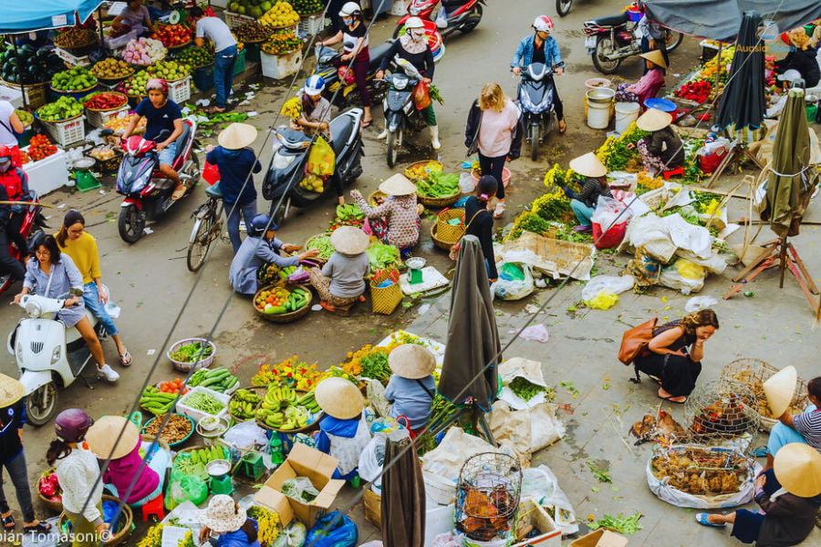 Explore vibrant local markets during the 8 Days Vietnam itinerary from Hanoi to Ho Chi Minh.